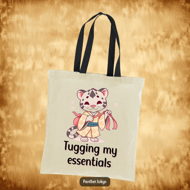 Funny tote bag with a cute panther in a patterned kimono, playfully tugging a silk ribbon.